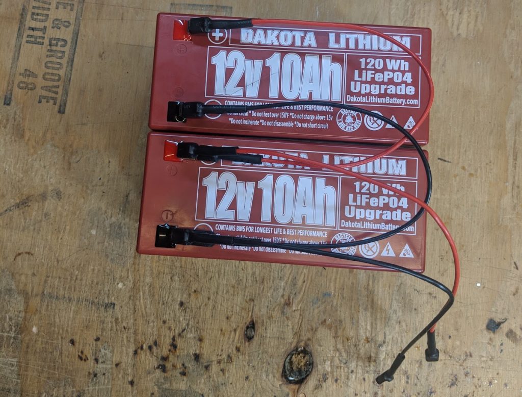 Two 12 volt batteries wired in parallel to increase the total amp hours